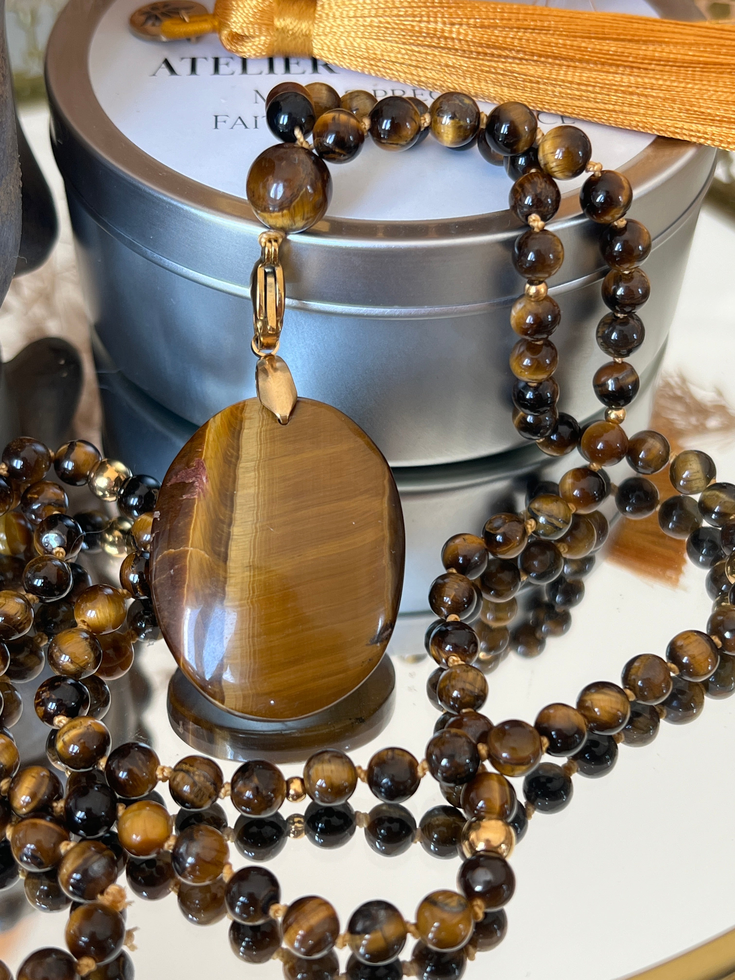 Mala en Oeil de tigre - Protection et ancrage